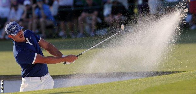 _106420272_koepka_sand_reuters.jpg