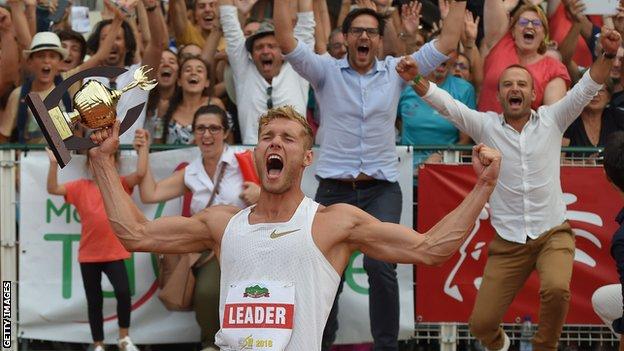 Kevin Mayer celebrates setting a new Olympic decathlon record