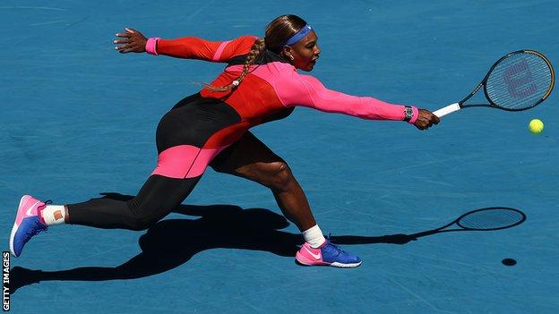 Serena Williams stretches for a shot