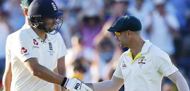 Dawid Malan is congratulated on his innings by David Warner