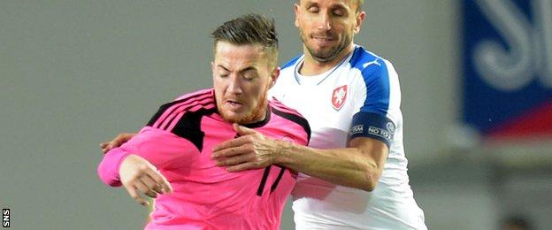 Ross McCormack holds the ball up for Scotland