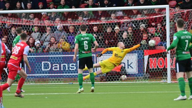 Sean Moore scored a superb opener for Cliftonville at Solitude