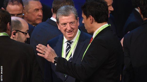 Roy Hodgson in conversation with Wales manager Chris Coleman at the Euro 2016 draw