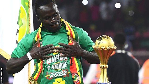 Sadio Mane with the Africa Cup of Nations trophy