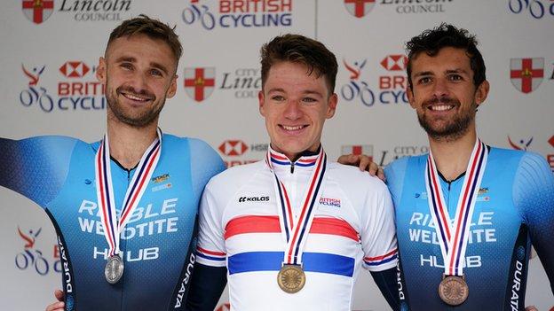 Daniel Bigham of Ribble-Weldtite Pro Cycling with silver medal (left), Ethan Hayter of Team Ineos Grenadiers with gold medal and James Shaw of Ribble-Weldtite Pro Cycling with bronze