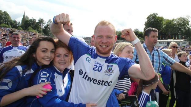 John McCarron celebrates with Monaghan supporters after the end of the game