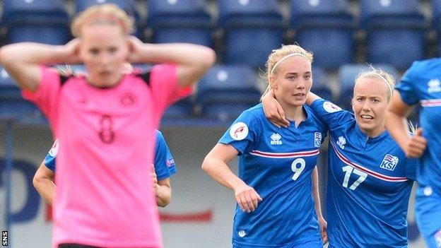 Scotland's Kim Little is left disappointed as Iceland celebrate