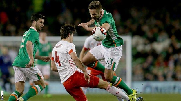 Republic of Ireland striker Kevin Doyle was injured after colliding with Switzerland's Timm Klose