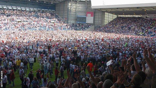 West Brom fans invaded the pitch after their 2-0 win over Portsmouth sealed their unlikely surival on the final day in 2004-05