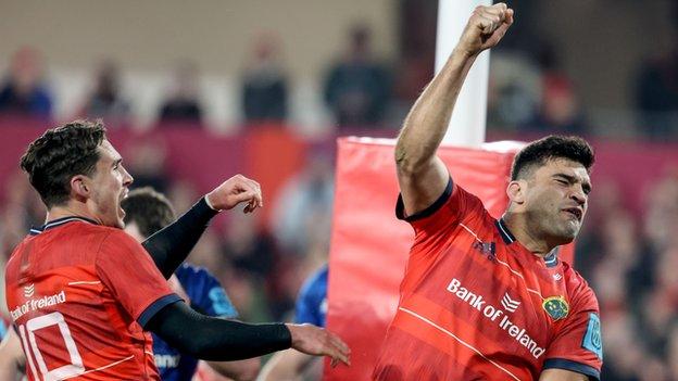 Damian de Allende celebrates his try but it failed to spark a Munster comeback in Limerick