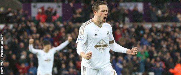 Gylfi Sigurdsson celebrates after scoring for Swansea