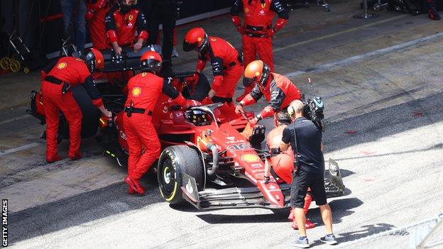 Charles Leclerc returns to the garage in his Ferrari