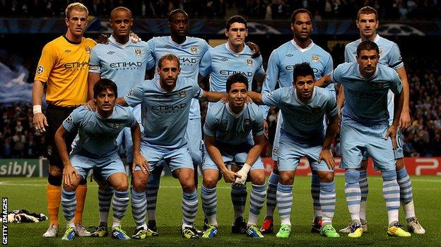 Sergio Aguero (front row, second right) lines up before City's first Champions League game, against Napoli in 2011