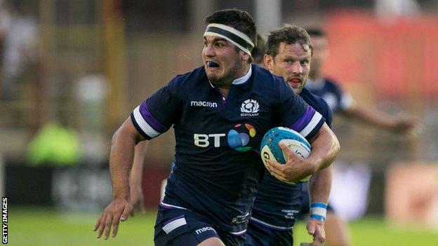 Stuart McInally runs with the ball for Scotland against Argentina