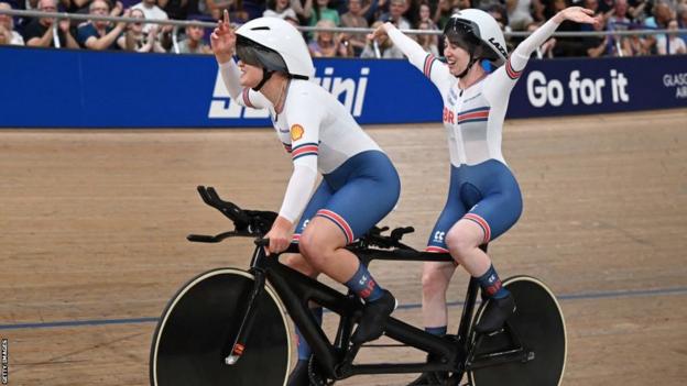 Briton Sophie Unwin and pilot Jenny Holl celebrate their gold medal win