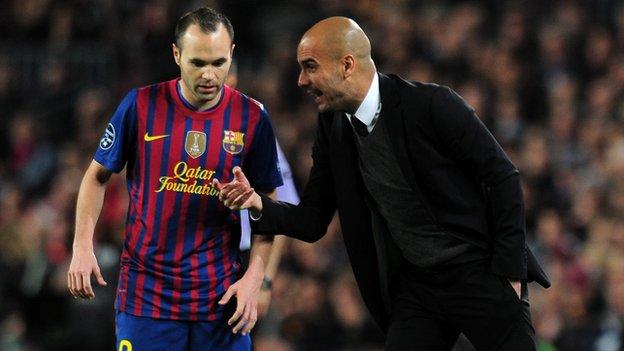 Pep Guardiola gives instructions to Andres Iniesta of Barcelona during the Champions League Semi Final, second leg match in 2012