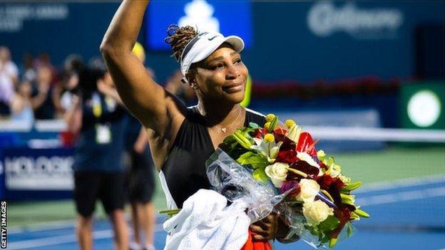 Serena Williams waves to the crowd in Toronto
