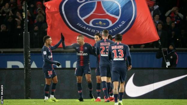 Paris St-Germain players celebrate during a game against Guingamp in Ligue 1