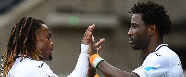Roberto Sanches and Wilfried Bony
