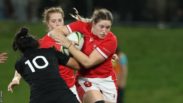 Gwen Crabb drives at the New Zealand defence during the World Cup quarter-final in October