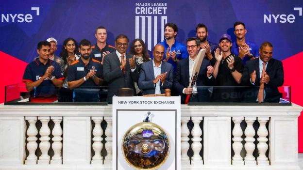 Major League Cricket players, founders and administrators rang the New York Stock Exchange closing doorbell  to observe  the motorboat  of the US' caller   nonrecreational  cricket league