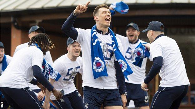 Ryan Jack leads the celebrations as the Rangers players celebrate at their training ground