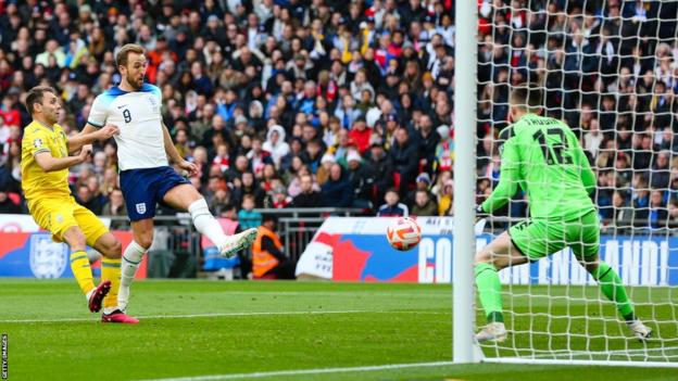 England striker Harry Kane scoring against Ukraine