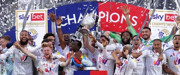 Fulham celebrate with the Championship trophy