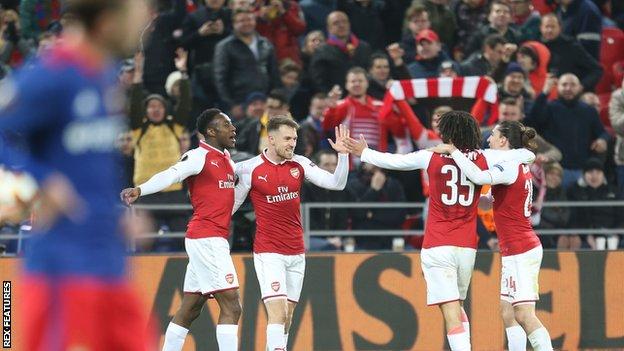 Arsenal's Aaron Ramsey celebrates with his team-mates