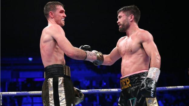 John Ryder shakes hands with Callum Smith