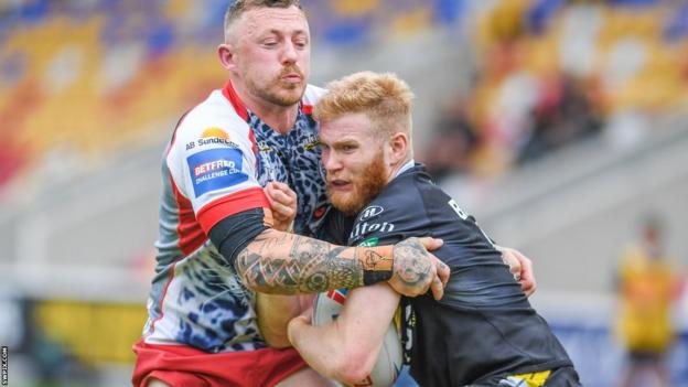 Leigh's Josh Charnley performs a tackle against York