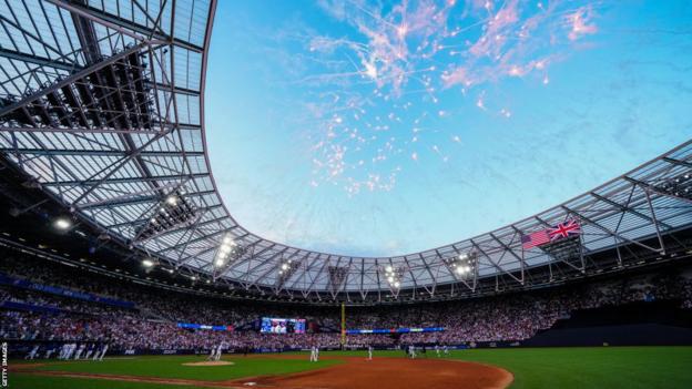 London Series: Chicago Cubs and St. Louis Cardinals walk out onto field and  national anthems 