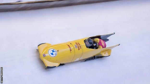 Mica McNeill and Montell Douglas competing in the two-woman bobsleigh