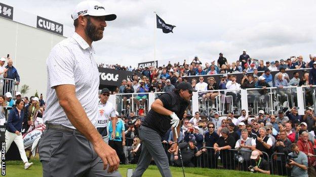 Dustin Johnson and Phil Mickelson playing at the the LIV Golf Invitational at Centurion Club