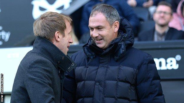 Graham Potter greets predecessor Paul Clement on his return to Liberty Stadium