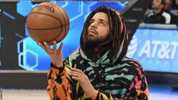 J Cole with basketball