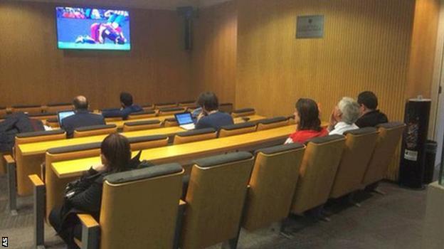 Atletico Madrid defender Filipe Luis watches from the Nou Camp press room