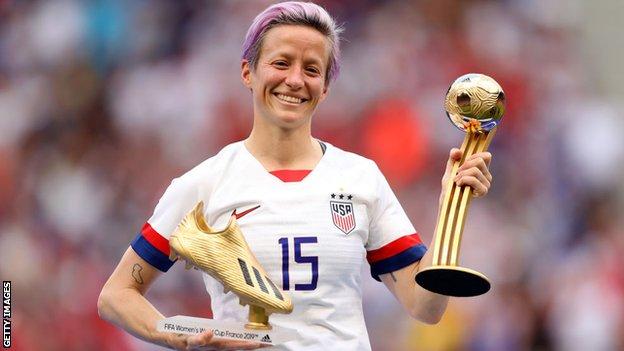 Megan Rapinoe with the Golden Boot and Golden Ball awards
