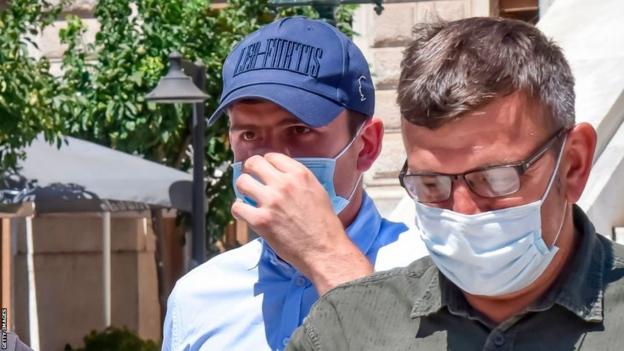 Manchester United captain Harry Maguire leaves court on the Greek island of Syros