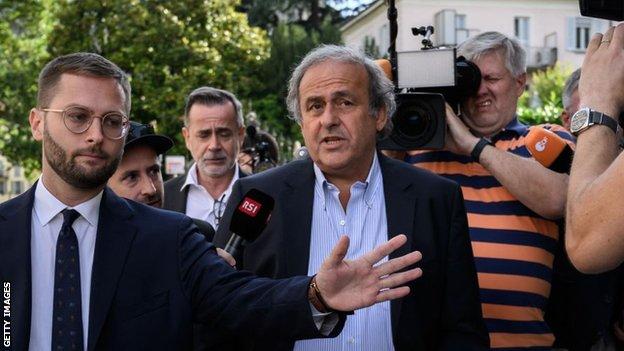 Michel Platini arrives at court in Switzerland