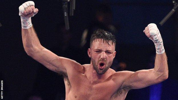 Josh Taylor celebrates after beating Jose Ramirez