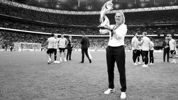 Sarina Wiegman lifts the Euro 2022 trophy at Wembley