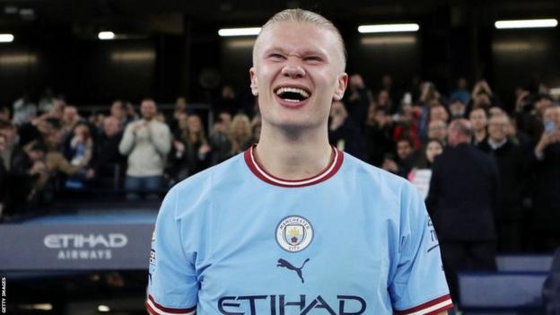 Erling Haaland of Manchester City celebrates after the team's victory during the Premier League match between Manchester City and West Ham United at Etihad Stadium on May 03, 2023 in Manchester, England.
