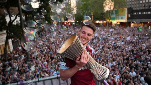 Declan Rice with the Europa Conference League trophy during West Ham's parade