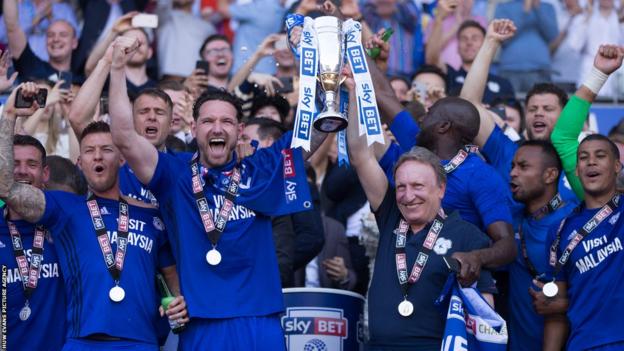 Neil Warnock and Cardiff celebrate promotion to Premier League