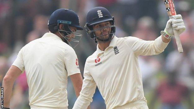 England batsman Ben Foakes raises his bat to salute the crowd after reaching his half-century against Sri Lanka