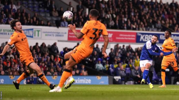 Conor Chaplin curls home his fourth goal of the season for Ipswich