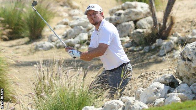 Eddie Pepperell in an awkward spot in round one at the Qatar Masters