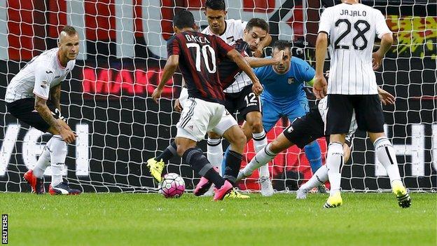 Carlos Bacca scores his first goal for AC Milan against Palermo