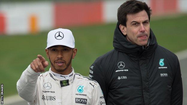 Mercedes driver Lewis Hamilton (left) and team boss Toto Wolff
